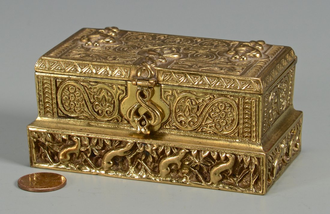 Tiffany Bronze Stamp Box: Tiffany Studios Gilt bronze stamp box in Venetian pattern, made in the form of an Italian Renaissance cassone with raised figural and geometric decoration, with latch lift and removable interior secti