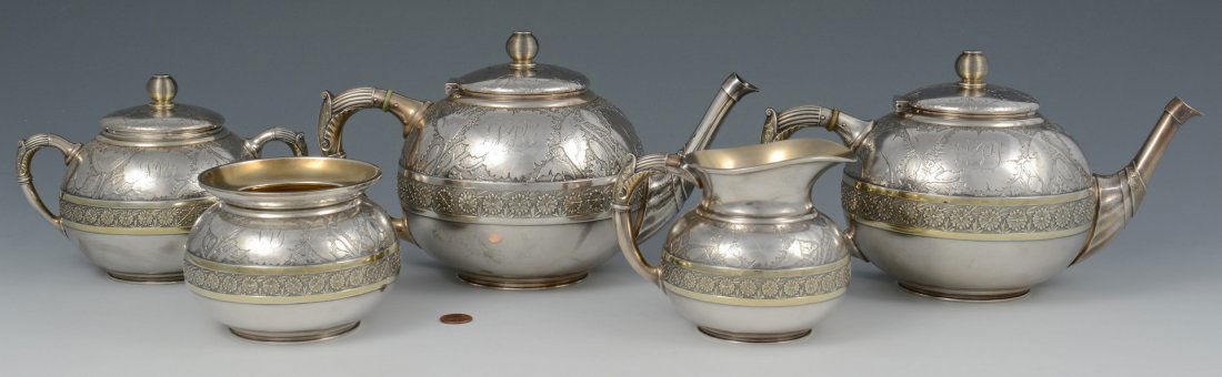 Wood & Hughes Aesthetic Tea Set: Aesthetic Movement sterling silver 5-piece tea and coffee service, marks for Wood and Hughes, pattern 25B (working New York, NY, 1845-1899) including tea and coffee pots, waste bowl and creamer, both