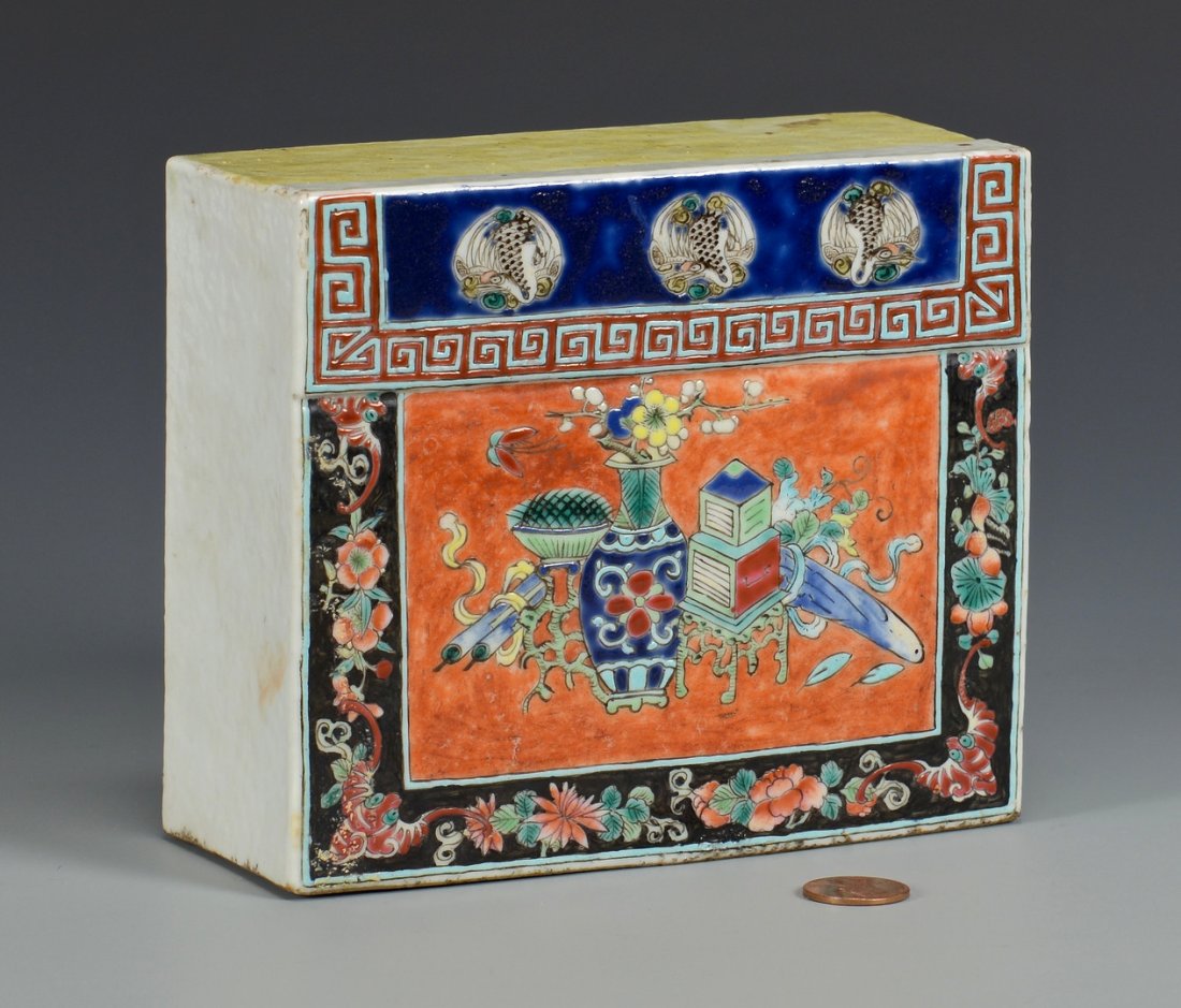 Chinese Porcelain Pillow: Chinese export porcelain pillow, modeled envelope style with decoration on one side of precious objects, surrounded by a famille noir border with floral decoration. Old note adhered to back with mostl