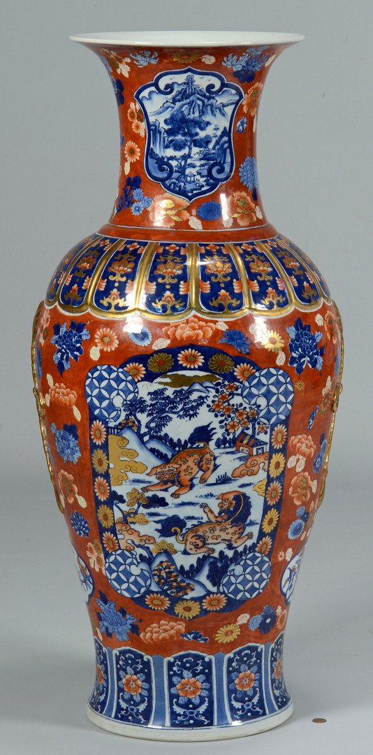 Monumental Japanese Imari Vase: Japanese Imari palace size vase, baluster form with gilt, floral, landscape and foo dog vignette decoration. Unmarked. 36 1/2" H. 20th century. Provenance: the collection of Stephen and Lisa Steiner S