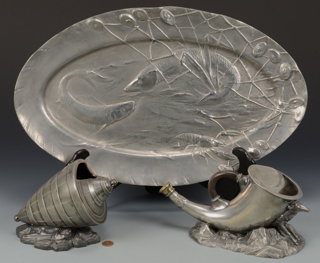 2 Pewter spoon warmers & tray: Two Victorian/Edwardian figural pewter spoon warmers, one in the shape of a hunting horn with horn handle and brass tip, supported on a stag's head on a rocaille base, worn English registry mark, 5"H 