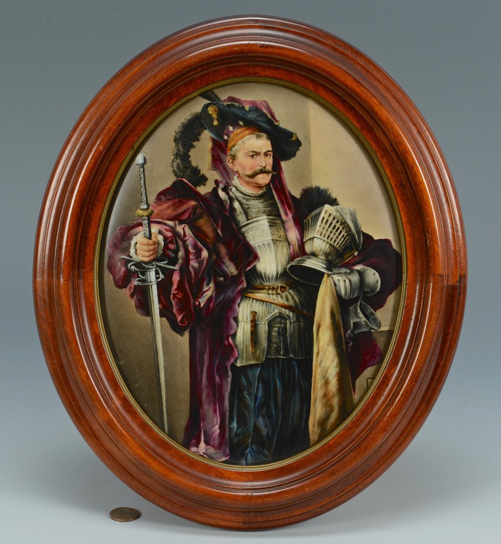 Porcelain Plaque, Man with Armor: Framed Berlin Style oval porcelain plaque depicting a gentleman attired in armor under a purple robe, holding a knight's helmet and sword. Several illegible impressed marks en verso. Housed in a dovet