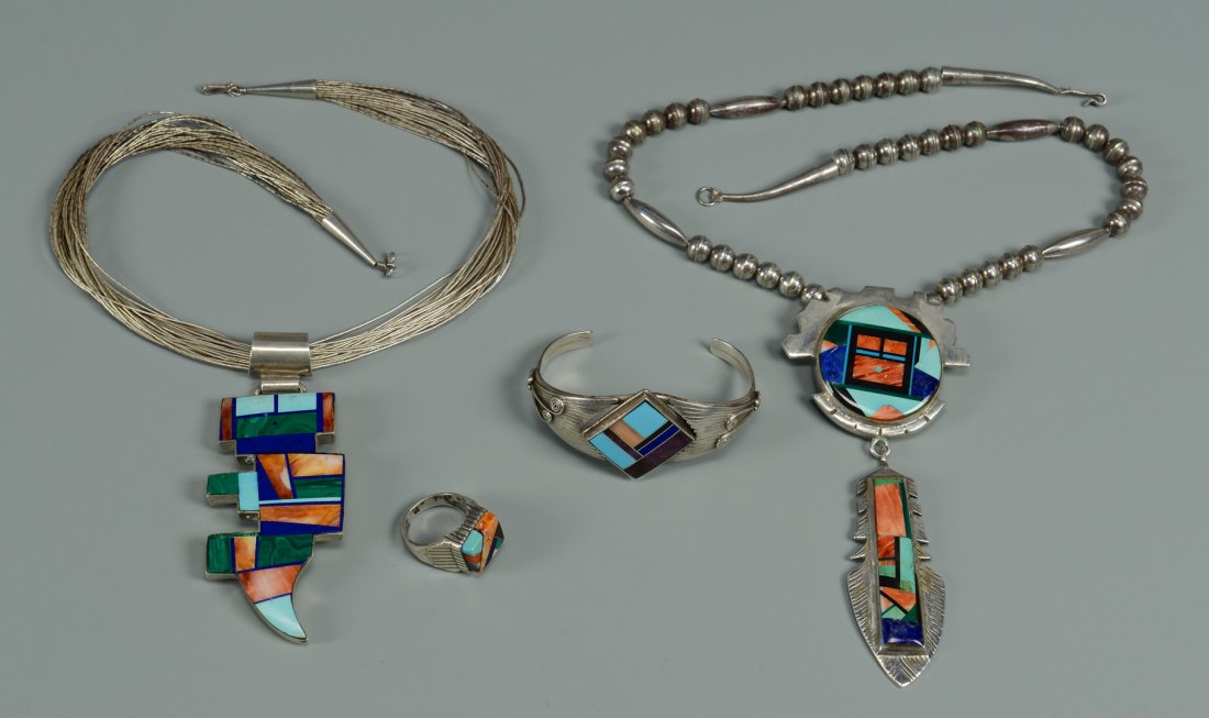 4 Native American Jewelry Items: Four Native American jewelry items including two (2) Paul Yellow Horse hardstone inlaid necklace pendants, one with beaded sterling necklace and the other with a muti-strand sterling necklace both mar