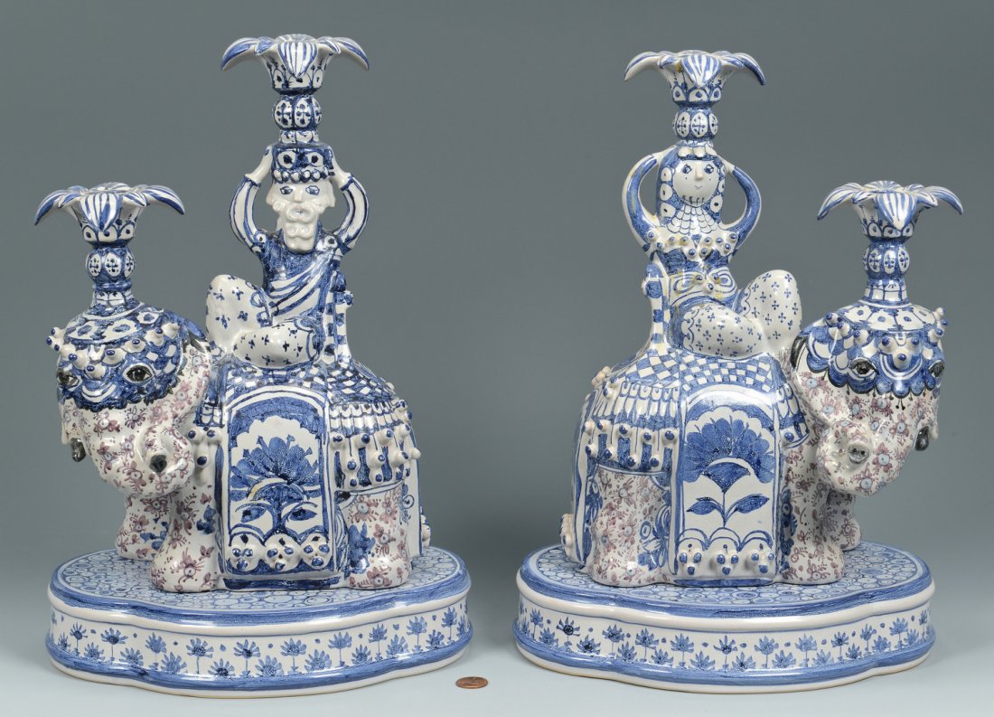 2 Bjorn Wiinblad candelabra w/ stands: Two Bjorn Wiinblad (Denmark, 1918-2006) ceramic candleabra and stands, modeled as vividly decorated figures atop elephants, 12" and 12-1/2"H. Each is accompanied by separate scalloped-side stands, 2"H