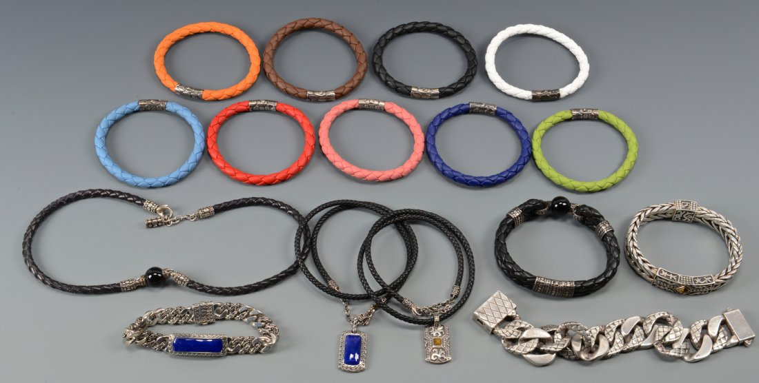 Group of John Hardy Men's Jewelry: 1st item: Naga silver link bracelet, 9" L x 1" W. 2nd item: Men's Dayak silver Batu rectangular chain station bracelet with tiger's eye, 8 1/2" L x 1/2" W. 3rd item: Sultan lapis bracelet, 8 1/2" L x