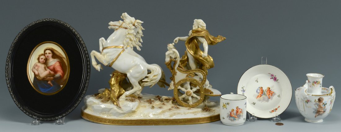 5 Pieces Continental Porcelain: 1st item: Capodimonte white and gilt porcelain figural group depicting a Zeus type figure with gilt robe atop a chariot, leading two raised horses, on an oval applied floral base with Greek Key border