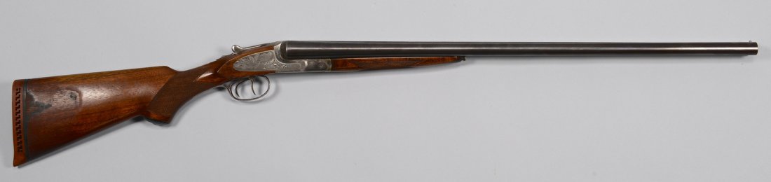 L.C. Smith Shotgun: L. C. Smith double barrel shotgun, Ideal grade,12 gauge, serial number 351929F, blued London steel barrels marked, "L. C. Smith Ideal Grade" and "Hunter Arms Co. MFRS Fulton New York". Solid rib, meta