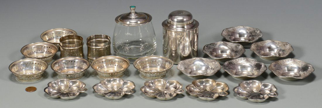 Misc. Sterling Items, 21 pcs. inc. butter pats: Grouping of miscellaneous sterling silver table items including 17 butter pats or ashtrays in 3 different styles, 2 by Gorham; Towle glass condiment jar with sterling lid; one sterling cannister tea c