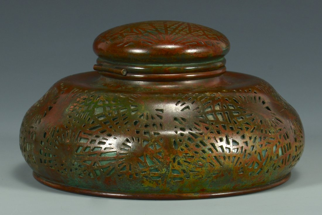 Tiffany Bronze & Glass Inkwell, Pine Needle Pattern: Tiffany bronze and green glass inkwell, Pine Needle pattern with brush insert and original patina. Base marked Tiffany Studios New York #847. 3 3/4" H x approx 6 1/2" W.
