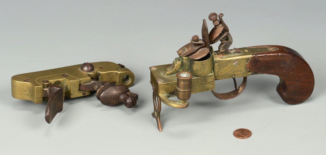 Flintlock Pistol Tinder Lighter and Cannon Flintlock: Flintlock pistol tinder lighter and cannon flintlock mechanism (2 items). Flintlock tinder pistol lighter, engraved brass body and stand, brass receptacle for small candle or rush, engraved steel trig
