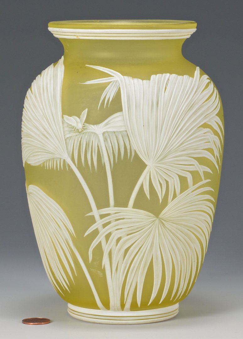 Thomas Webb Cameo Art Glass Vase: Thomas Webb and Sons art glass vase, unmarked, ovoid body with citrine yellow ground, white overlay carved with ferns, butterfly, bee and moth decoration. English, circa 1900. 8" H.