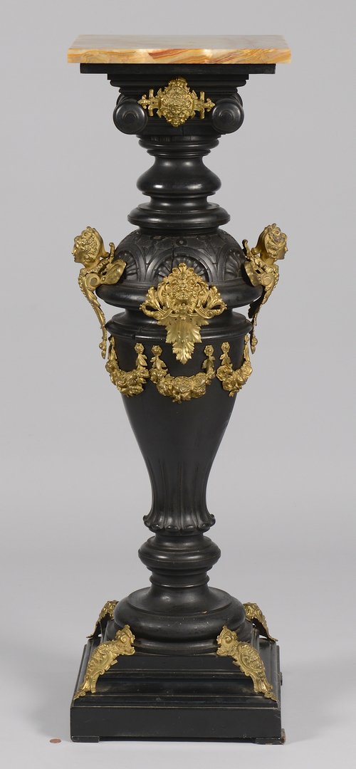 Aesthetic Movement Pedestal w/ Ormolu Mounts: Aesthetic Movement pedestal with square, apricot mottled marble top, ebonized wood carved column mounted with gilt bronze caryatids, lion and gargoyle masks and rose swags. 46" H x 14" square top x 14