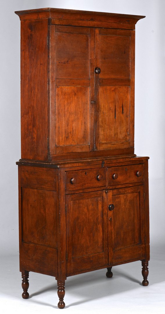 Kentucky Walnut Sheraton Press: Kentucky walnut Sheraton press in the old surface. Two part construction, poplar secondary. Ogee molded cornice over two long paneled doors with a base having two dovetailed drawers over paneled doors