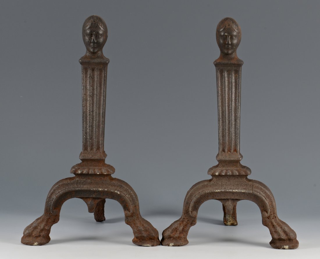 Pr. Figural Andirons, poss. Southern: Pair of 19th c. iron andirons, figural heads over a column form shaft and paw feet. 15"H x 9-1/4" W x 10"D. Possibly the Luray Furnace of Virginia, mid 19th century. Found in Middle Tennessee.