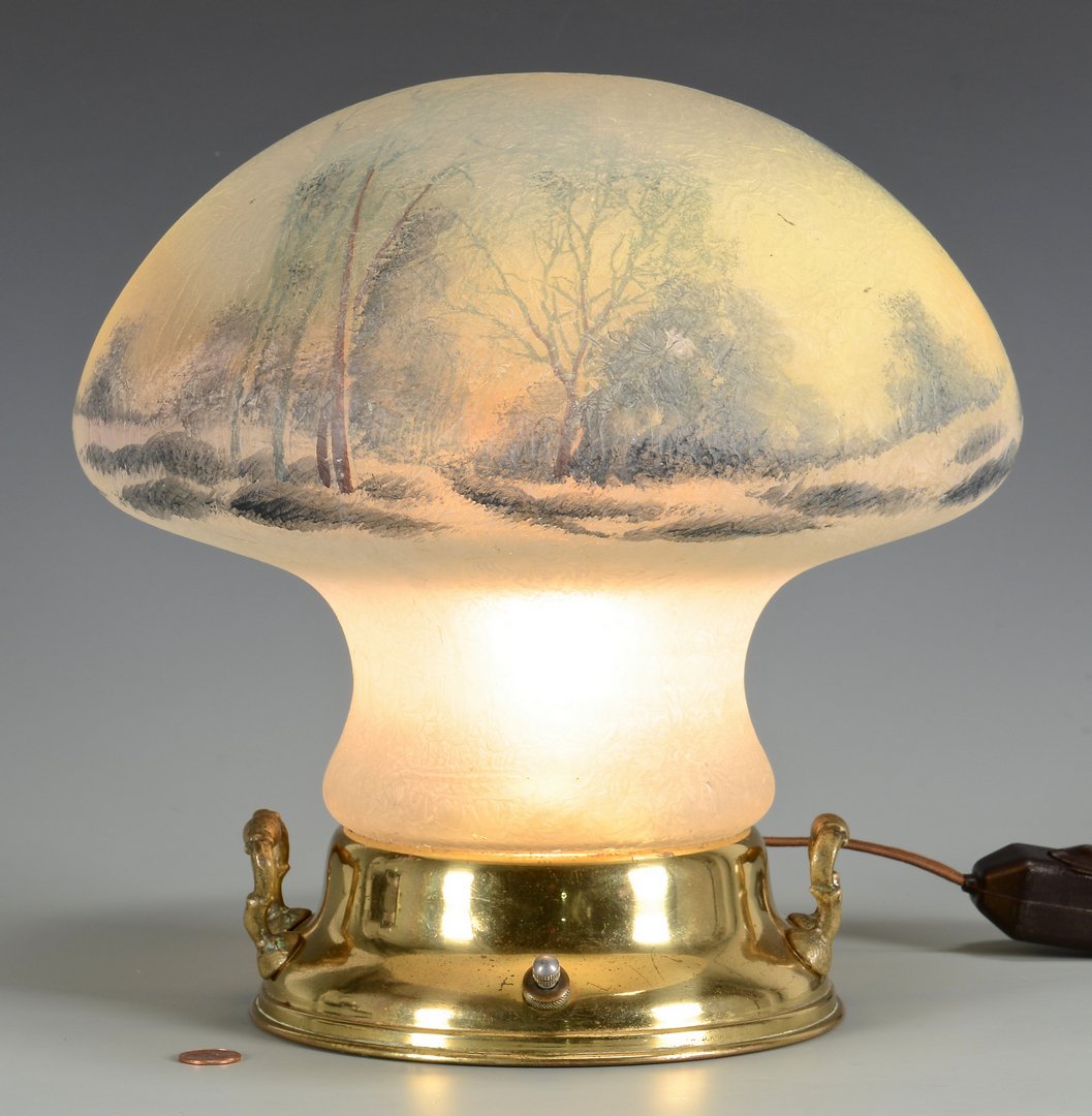 Pairpoint Mushroom Table Lamp: Pairpoint table lamp with mushroom-shaped, "chipped glass" textured shade decorated with a reverse painted landscape scene; circular brass base with two handles. 12"H x 12" diameter.
