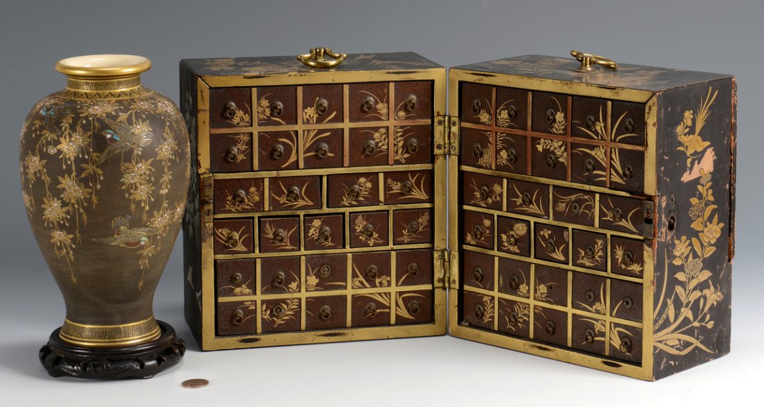 Japanese Lacquered Box with Vase: 1st item: Japanese wooden lacquered apothecary cabinet, decorated with gilt floral sprays and birds on black ground. Hinged cabinet opens at side to reveal an interior fitted with several drawers and 