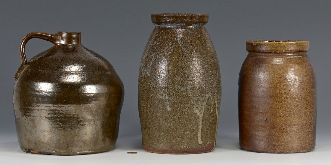 3 Southern Stoneware Pottery Forms: Grouping of Southern stoneware forms. 1st item: Alkaline glaze stoneware preserving jar with blue rutile runs, impressed circular mark on shoulder. 10 1/4" height. Late 19th century. 2nd item: Squat b