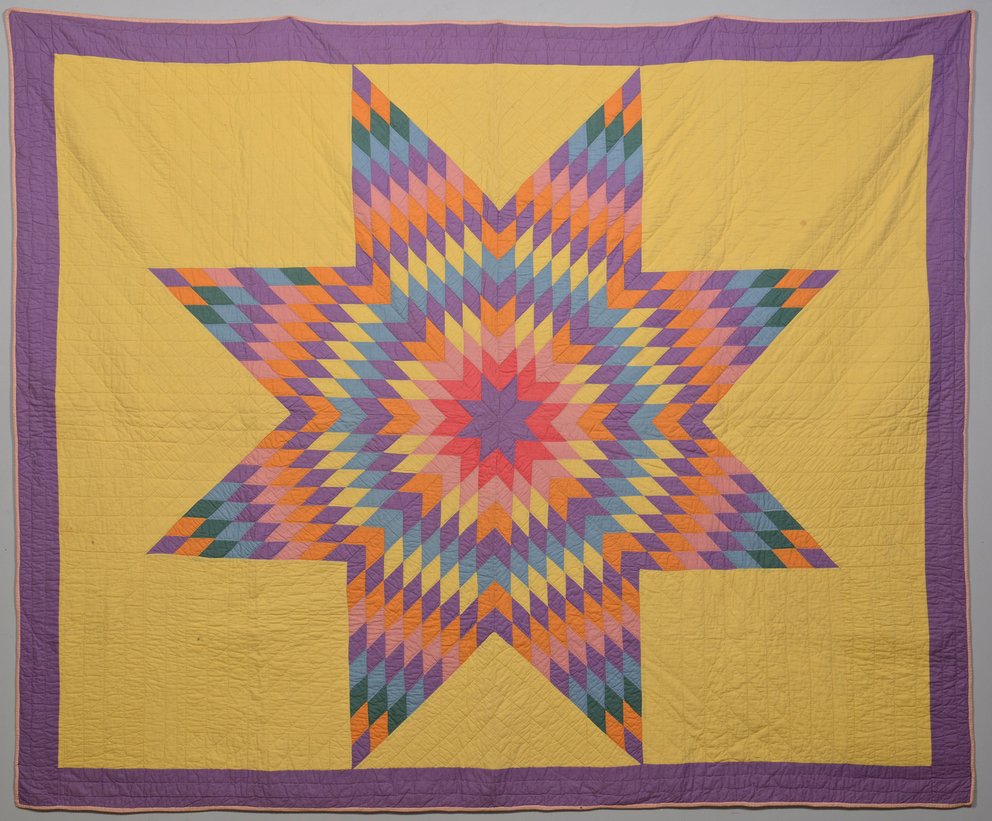 Lone Star Quilt: "Lone Star" or "Star of Texas" pattern pieced and appliqued quilt, hand stitched in pastel shades on purple background with pink backing. 88" x 72" Circa 1900. Provenance: descended in a longtime Midd