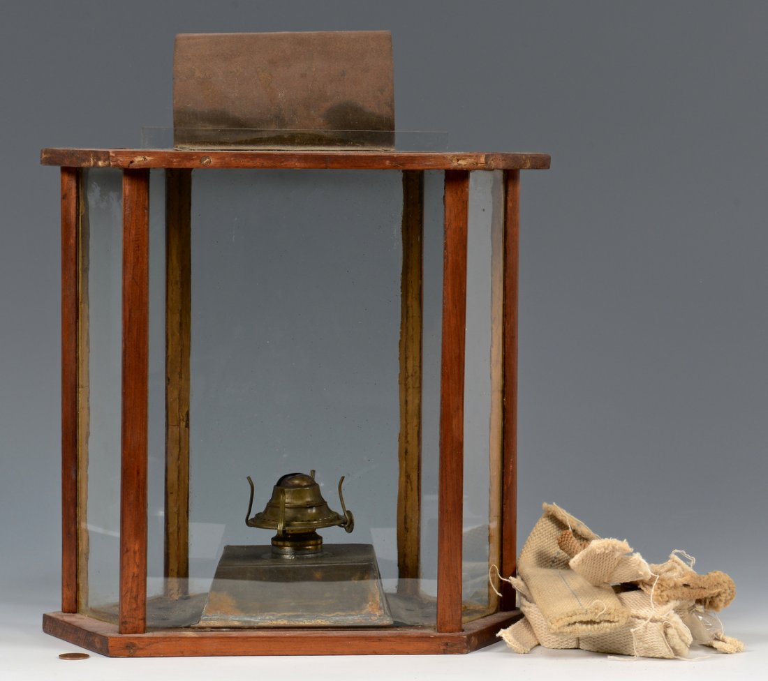 American Wooden Primitive Lantern: Large primitive six-sided lantern, having a wooden hexagonal top with metal dome and glass sides. Wooden stiles join to top with unusual paw or leaf-shape through-tenons. Also included are several len