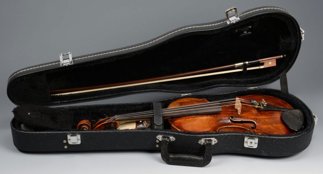 German Violin, Klotz school & Bow: 1st item: German violin, coffin form, unsigned but atrributed to the Klotz Family of violin makers. Late 18th century. Note: Old repair receipts included with this lot indicate that this violin is mos