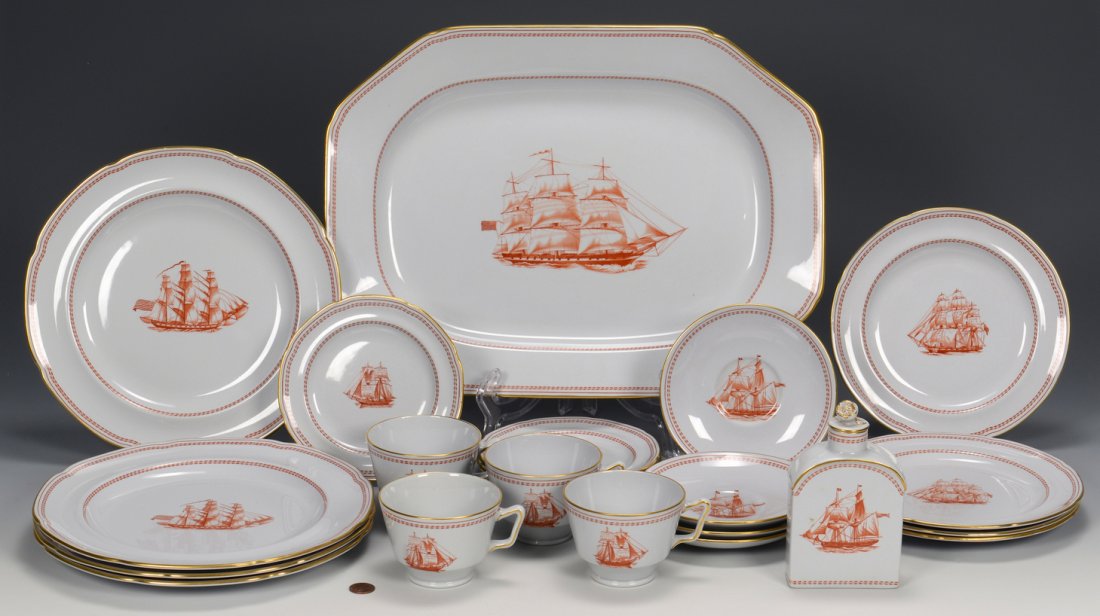 Spode Porcelain, "Trade Winds", 22 pcs: 22 pieces Spode porcelain, Trade Winds pattern, red border with gold trim, central vignette of a ship. Includes four dinner plates, four cups with saucers, four bread and butter plates and four lunche