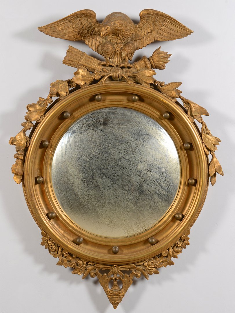 Federal Style Bull's Eye Mirror w/ Eagle: Federal Style Bull's Eye mirror, eagle with arrows and torch crest, applied foliate decoration to the sides and bottom, and twelve (12) balls around the convex mirror. 39 1/2" h x 28" dia. x 4" D. Lik