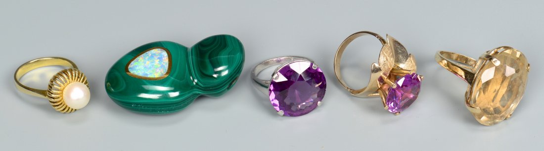 Grouping of Gold Jewelry w/ Stones, 5 pcs.: Grouping of five jewelry items with stones. 1st item: Malachite smooth stone sculpture with opal-like pendant with gold ring surrounds, 1 3/4" L. 2nd item: 10K yellow gold oval lemon citrine ring, sz 