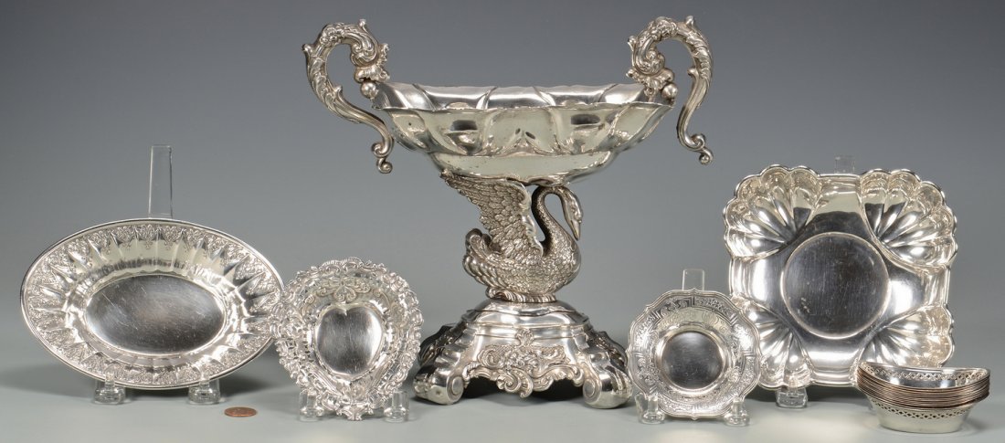 Silver swan compote, candy dishes, 17 pcs: 17 pcs assorted silver hollowware. Includes: Continental (likely German) silver centerpiece or compote with figural swan support, shaped bowl with two cast S scroll handles and a floral scroll repouss