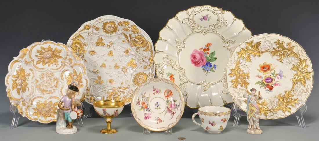 Grouping of 8 Porcelain Items: Assembled grouping of eight (8) porcelain items. 1st item: Meissen floral and gilt cup with saucer, both with blue crossed swords mark, cup measures 2 3/8" H and saucer diameter is 5 5/8". 2nd item: G