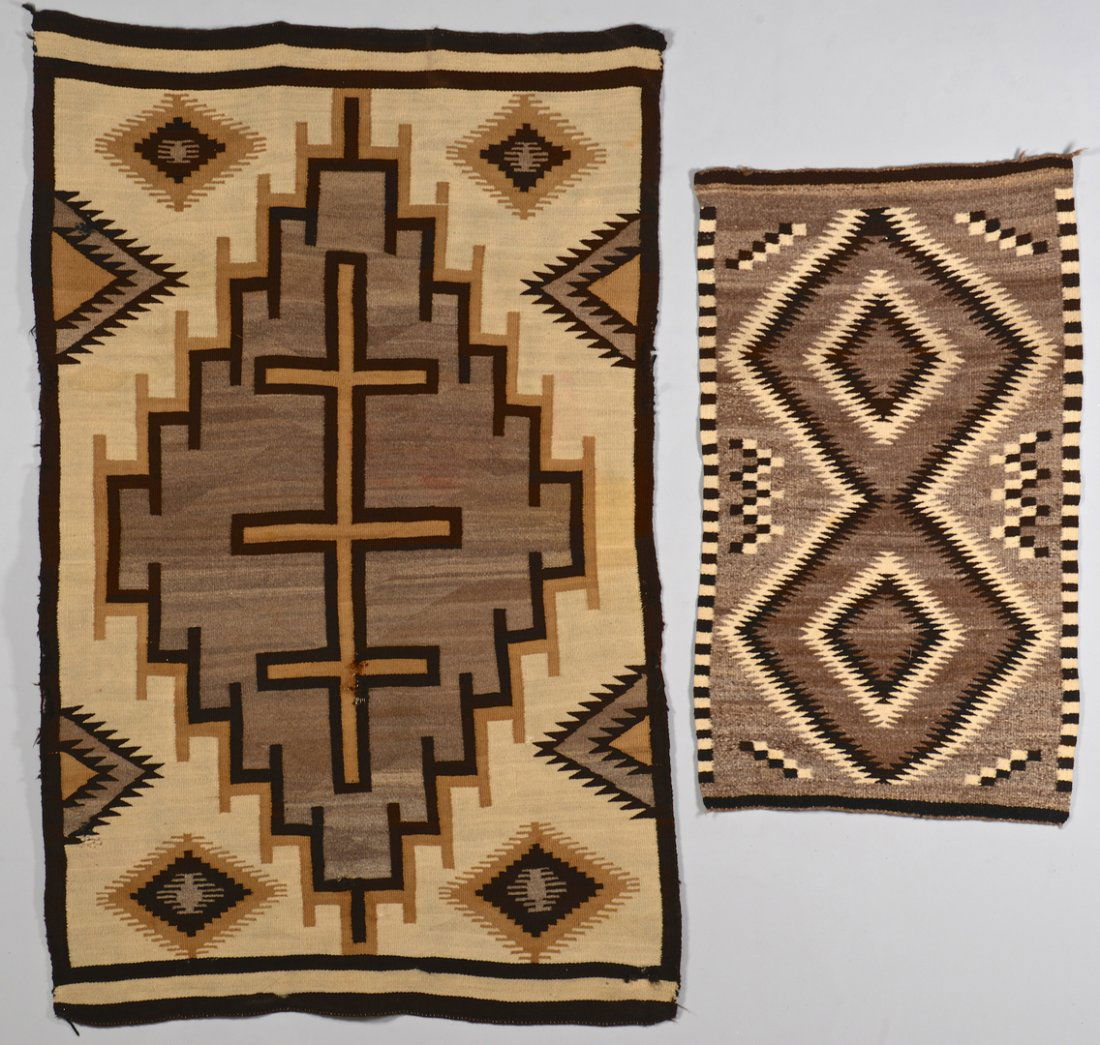 2 Navajo Rugs, 1 Crystal: 1st item: Native American Navajo Crystal rug with large central geometric design, four smaller serrated diamond design and serrated diamond designs around the border, in colors of tan, dark brown, lig