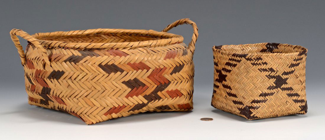 2 Native American Baskets, Choctaw & Chitimacha: 1st item: Choctaw rivercane square form basket having handles and walnut and bloodroot dyed weavers in a cross pattern. 5 1/2" H x 13" W x 9 1/2" D. 20th century. 2nd item: Chitimacha double weave squ