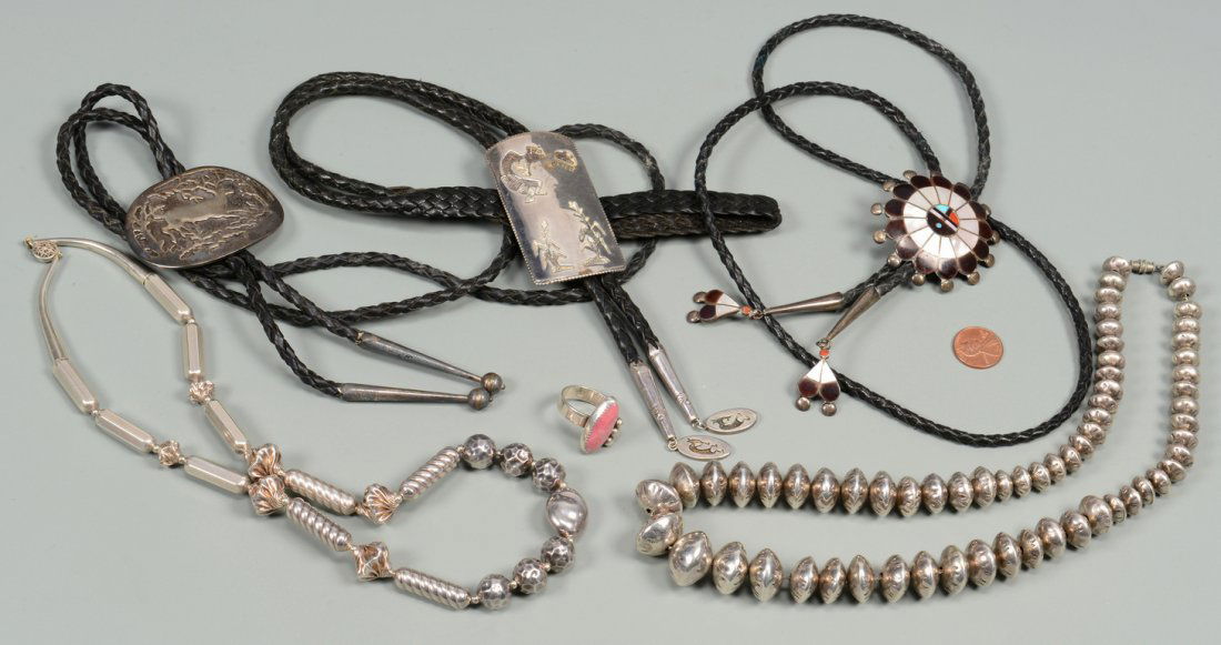 Silver Native American Jewelry: Silver Native American jewelry including 3 bolo ties with leather bolos: one sterling (marked) tie decorated with rainmaker, cloud and cornstalks, marked "CM" with silver rainmaker tips; one sterling
