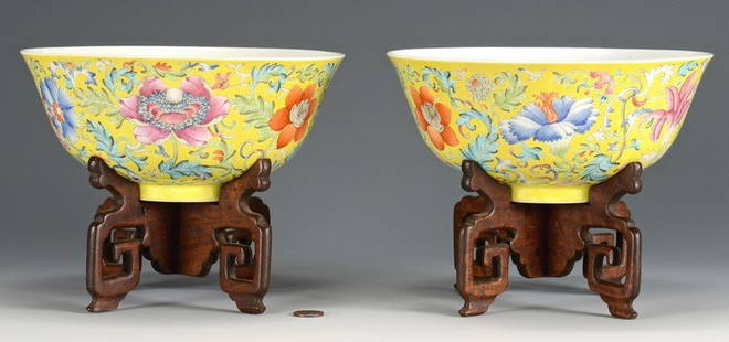 Pr. Guangxu Chinese Famille Rose Bowls, yellow ground: Pair of Chinese Imperial yellow porcelain bowls, the exteriors with famille rose floral and scrolling vine decoration on yellow ground, the interiors decorated with five (5) red bats, and the footed b
