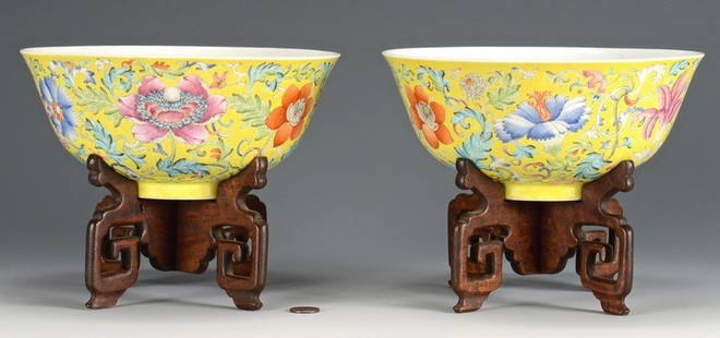 Pr. Guangxu Chinese Famille Rose Bowls, yellow ground: Pair of Chinese Imperial yellow porcelain bowls, the exteriors with famille rose floral and scrolling vine decoration on yellow ground, the interiors decorated with five (5) red bats, and the footed b