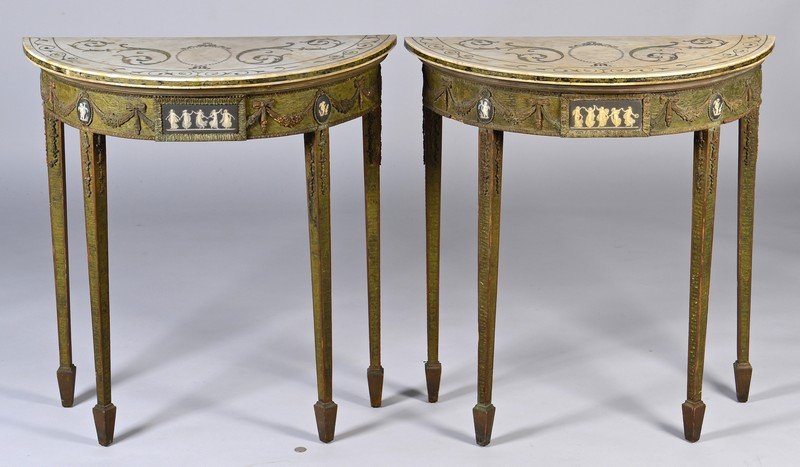 Adam Style Scagliola Marble Console Tables: Near pair of Neoclassical Adam style green painted console tables with Scagliola marble tops and applied Wedgwood plaques; demilune form with applied carved floral garland swags and bows, interspersed