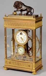 French Gilt Bronze Falling Ball Mantle Clock: French bronze and gilt bronze Spherical Weight or "Falling Ball" mantle clock, with barometer and thermometer. Top features a bronze standing lion figure atop a cover that lifts for the deposit of bal