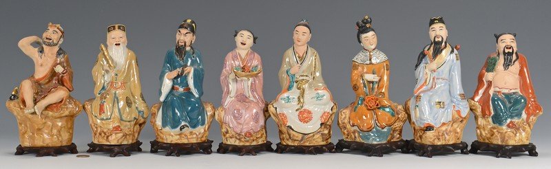 8 Daoist Immortal Figures: 8 Chinese Daoist immortal figures, Republic Period, earthenware with unglazed skin and glazed robes, impressed character marks to undersides. Each figure is depicted with various objects symbolizing t
