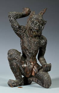 Chinese Carved Hardwood Sun Wukong Figure: Carved Chinese hardwood figure of Sun Wukong or Monkey King, depicted in a kneeling stance with clenched fists, an open mouth baring fangs and wearing an elaborate crown. 13 1/2" H x 8 1/4" W x 5