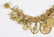 Gold Charm Bracelet, 94.4 grams, 22 charms - 2