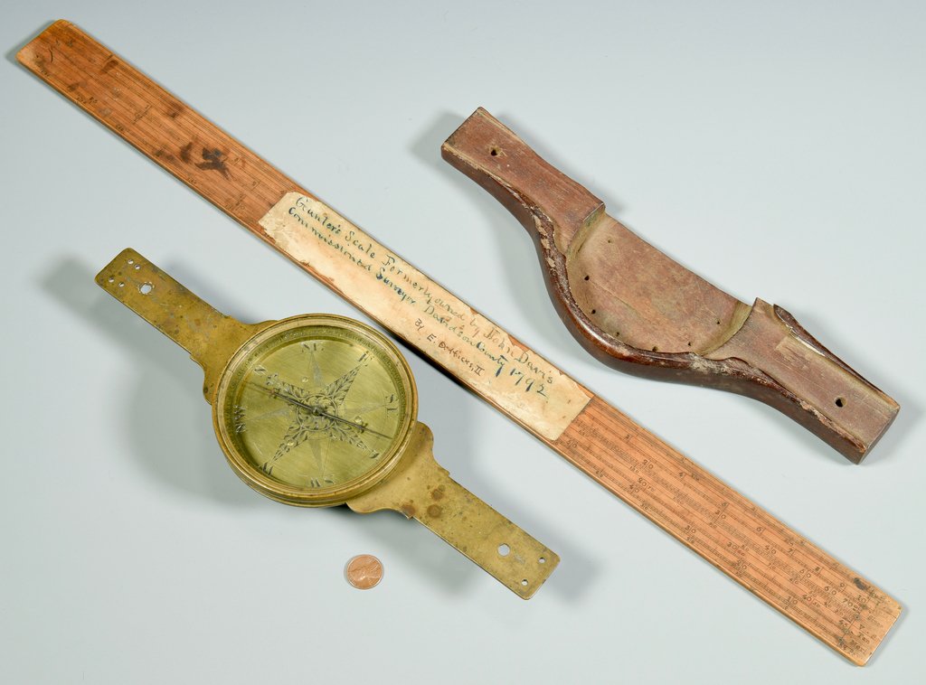 John Davis's Brass Surveyor Compass and Scale: Brass surveyor compass and Gunter's Scale used by John Davis to survey Davidson County (Nashville) in the late 1700s. Brass Compass with engraved eight-point dial, with North indicated by a fleur-de-l