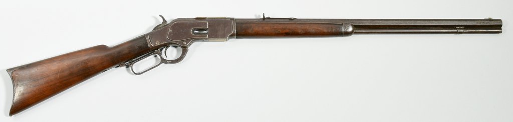 Winchester 1873 3rd Model Rifle, .32-.20 Caliber: Model 1873 Winchester rifle (3rd Model), .32-.20 Caliber. Serial number 318911. Barrel marked, "WINCHESTER REPEATING ARMS NEW HAVEN CT" and "KING'S IMPROVEMENT PATENTED MARCH 29, 1866. OCTOBER 16, 186