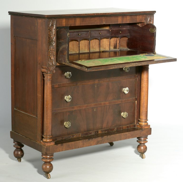Classical Desk, Devon Farm history: Classical butler's desk originally belonging to John Davis (1770-1853) of Nashville. Mahogany desk with molded rectangular top over a large overhanging drawer flanked by carved rosette panels. Top dra