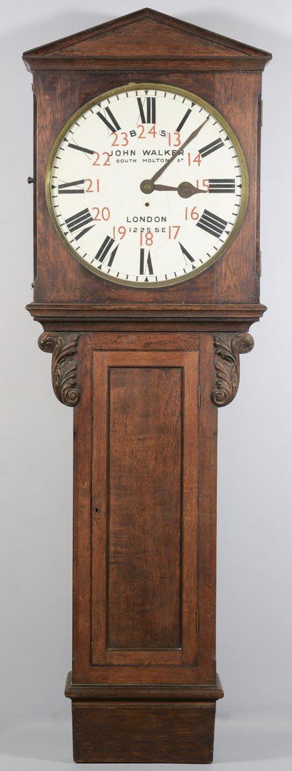 John Walker English Act of Parliament Clock: English "Act of Parliament" clock, possibly from the Brighton & South Coast Railway, oak case with applied carved foliate scrolls to the upper case. Clock face is marked "B (S) John Walker, 1 South Mo