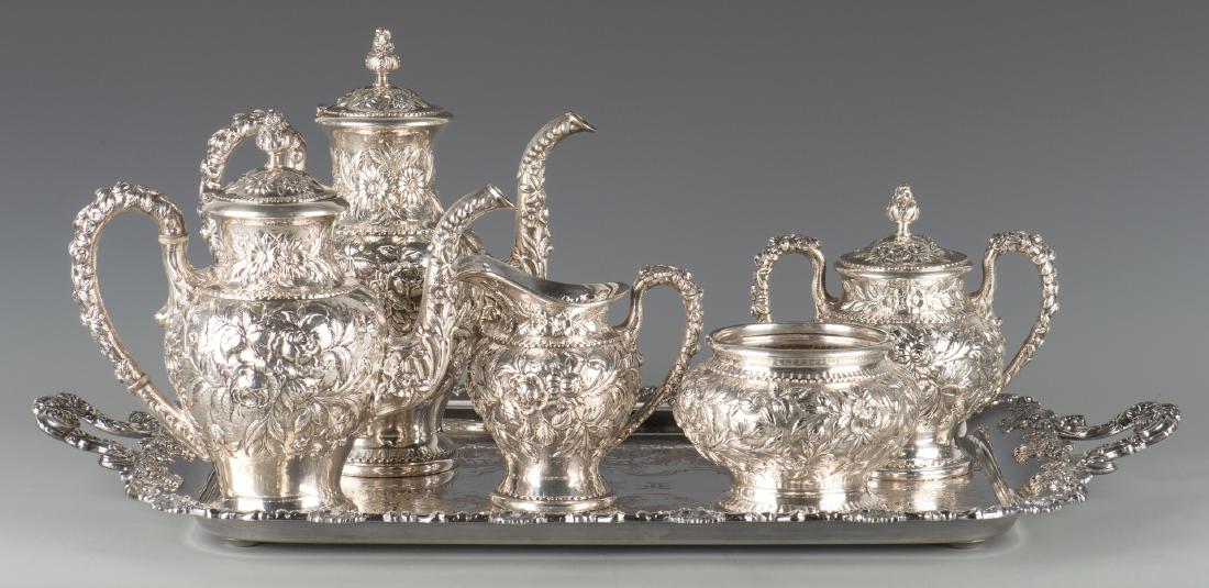 Kirk Repousse Sterling Tea Set, 5 pcs.: S. Kirk & Son Sterling Tea Service in the Repousse pattern, having allover raised floral decoration, marked "S. Kirk & Son Inc, 925/1000, Sterling 74". Set includes coffeepot with matching teapot, cre