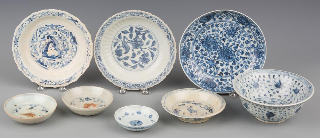Asian Blue White Bowls inc Ming: Group of 8 Chinese/Southeast Asian blue and white bowls, Ming and Qing Dynasty periods. Includes an 8" dia. bowl with chrysanthemum motif; 2 bowls with scalloped rims and fluted sides, one with bird i