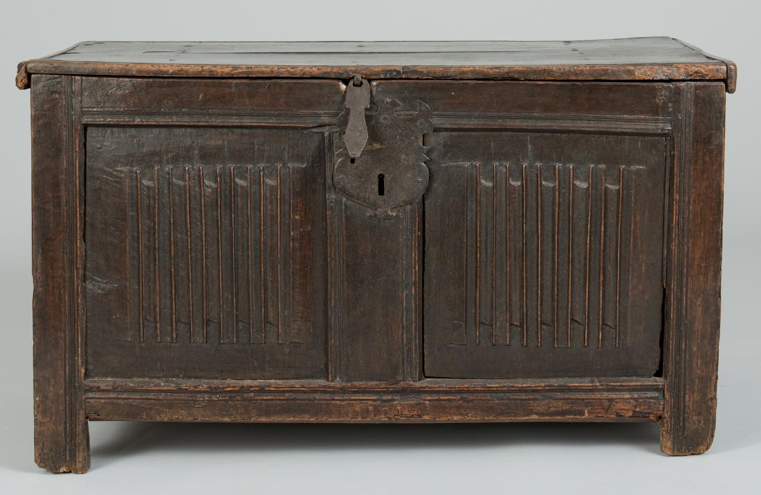 Tudor 16th c. Linenfold Coffer: Tudor period joined oak coffer with six linenfold carved panels, channel and groove molded stiles and rails, cleated lid. Original strap and loop and plate and loop hinges and hasp, original lock plat
