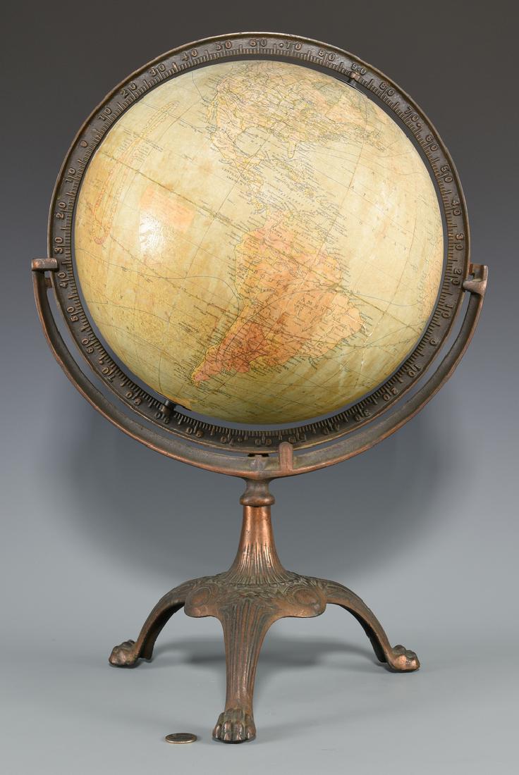 G. A. Mullin Co. Terrestrial Globe on Stand: 12-inch terrestrial globe with label reading "George A. Mullin Co., Cedar Rapids, Iowa" mounted onto a cast iron lion paw stand. 22 1/4" H x Approx. 15" dia. Early 20th century. (Additional high-resol