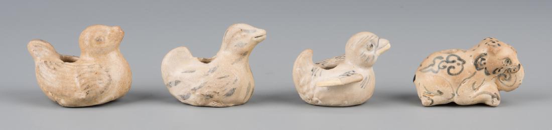 4 Figural Ceramic Water Droppers: A collection of four early Vietnamese blue and white glazed figural water droppers, in the form of an elephant, 2 ducks, and 1 bird. All approx. 3" long. 19th century and possibly earlier. Provenance: