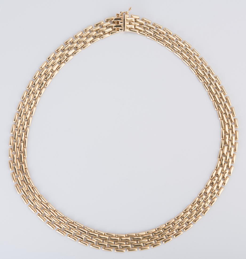 14K Italian Collar Necklace: 14k yellow gold Italian panther link choker necklace, marked 14K Italy with maker's mark on reverse of clasp, 16 3/4" L x 3/8" W with safety clasp. 20 grams. (Additional high-resolution photos are ava