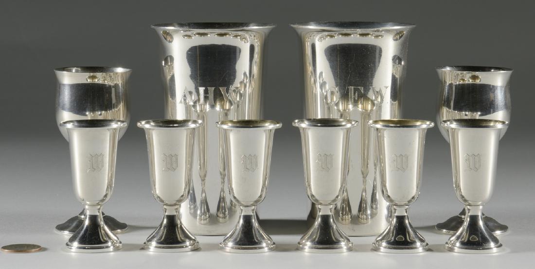 8 Sterling Cordials & 2 Sterling Tumblers: Set of 6 small cordials marked "Sterling WEB 28" on the base for Web Silver Company with gilt interiors and monogrammed (3" H) , plus 2 larger ones, marked "Reed & Barton H121" to the base (4 1/8" H);